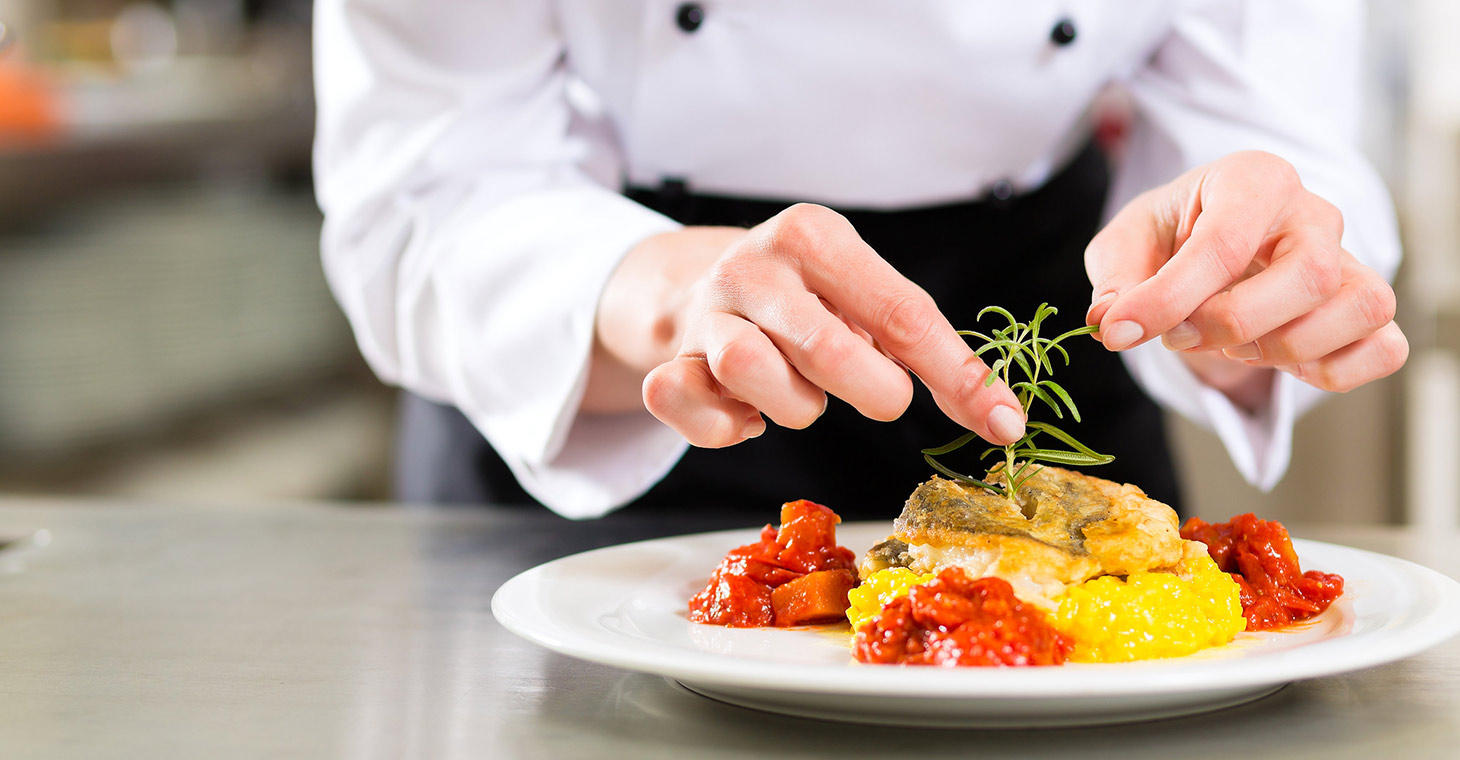 Chef prepares a fresh meal