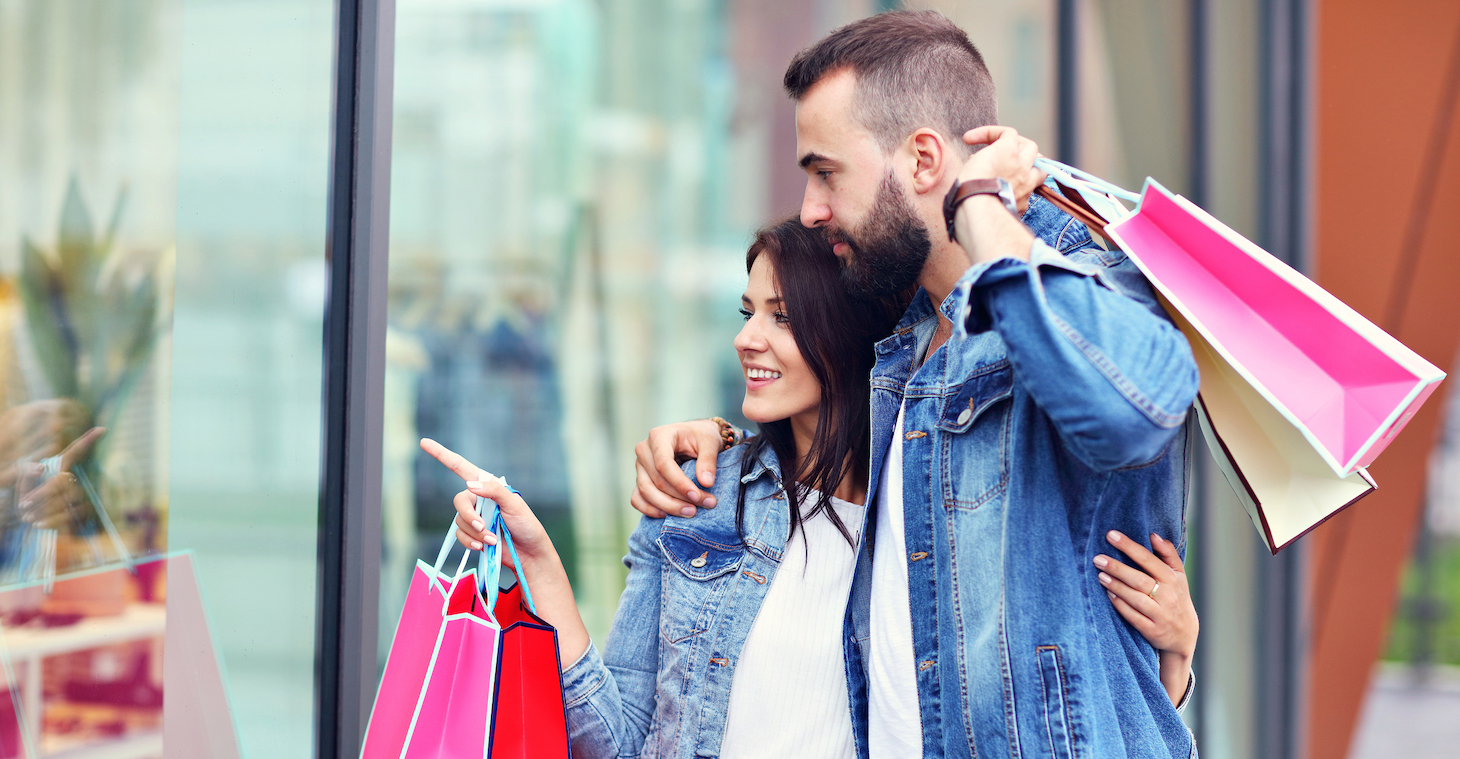 Happy couple shopping in Saratoga Springs