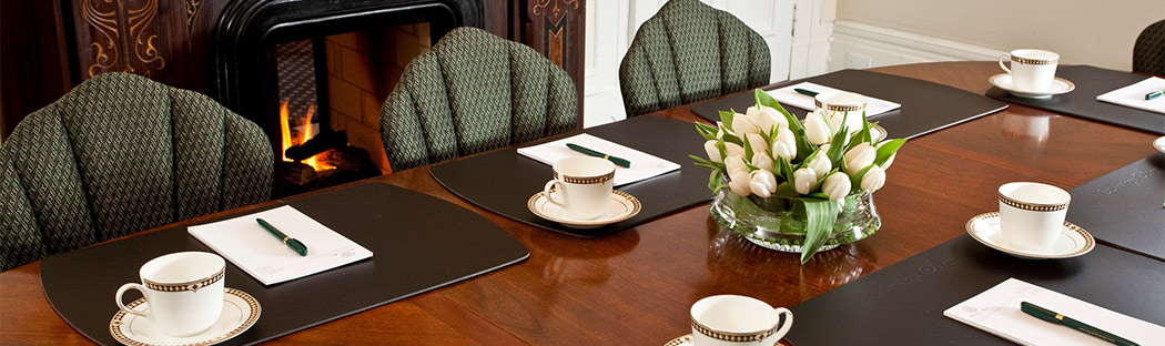 Meeting at Board Room Table at a Saratoga Springs hotel